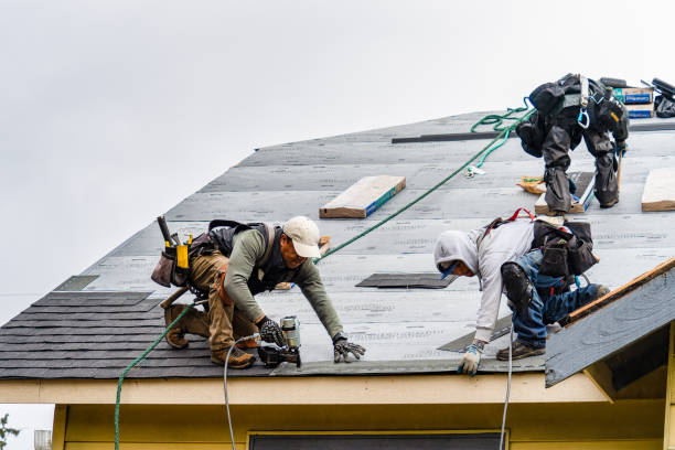 Professional roof repair in progress on residential home in Wilsonville