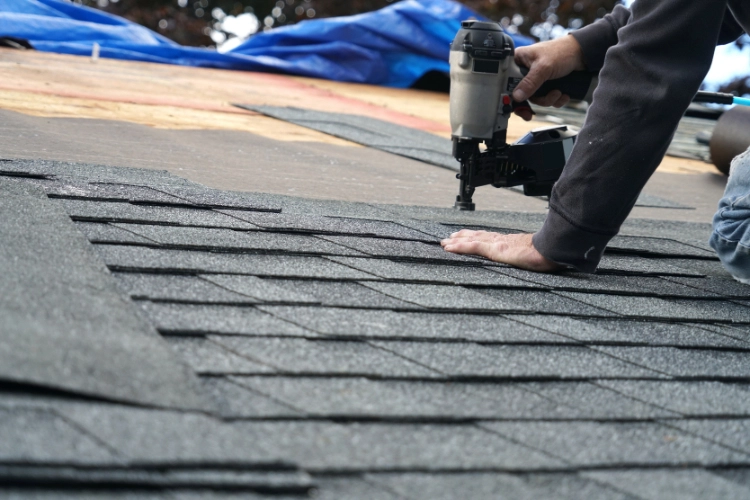 Professional roofers working on roof replacement in Oregon City OR